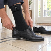 Heated sock fitting inside a normal everyday shoe